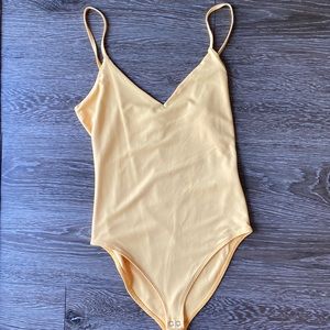 Forever 21 Yellow Bodysuit Tank. Size Small. NWT